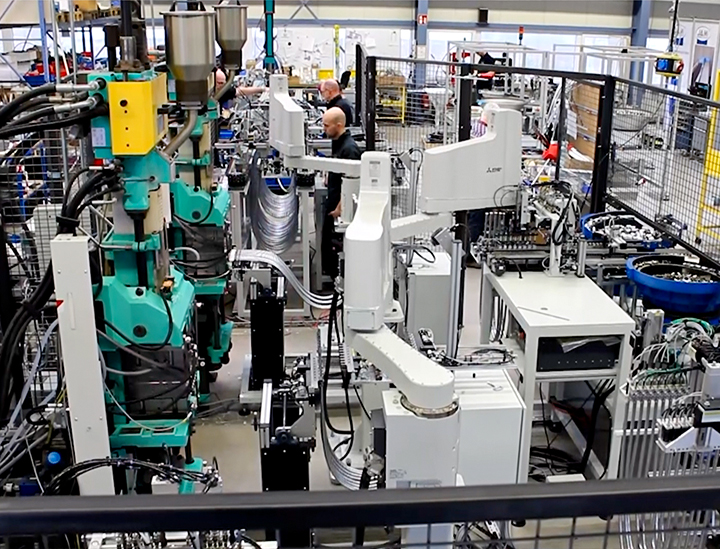 JAM Industrieroboter Robotertechnik Maschinenbestückung Druckgussmaschine Duschschläuche